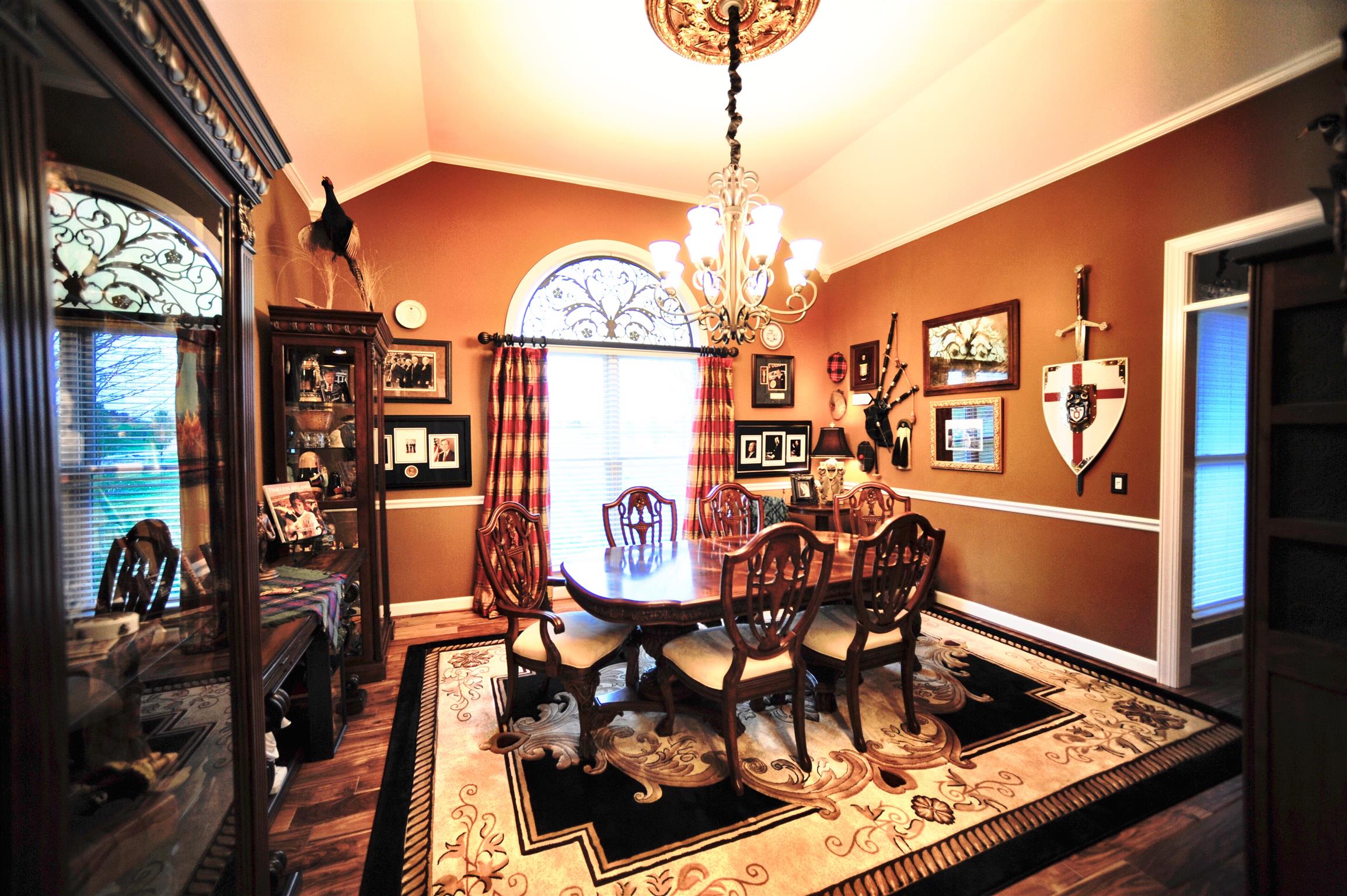 2186 H York Road Pleasant View, TN 37146 - Photo 14 of 30 a view of a dining room with furniture and chandelier