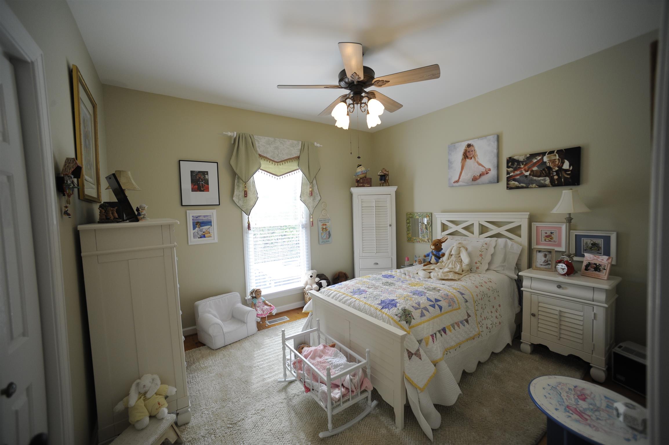 2186 H York Road Pleasant View, TN 37146 - Photo 20 of 30 a bedroom with a bed furniture and a window