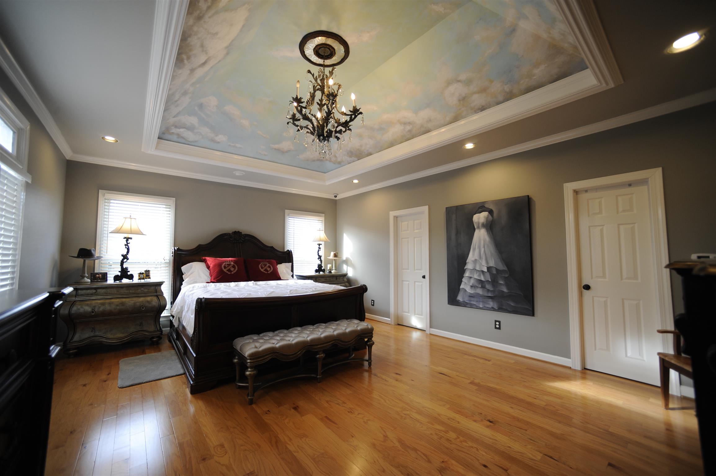 2186 H York Road Pleasant View, TN 37146 - Photo 7 of 30 a spacious bedroom with a bed painting on wall and a large window