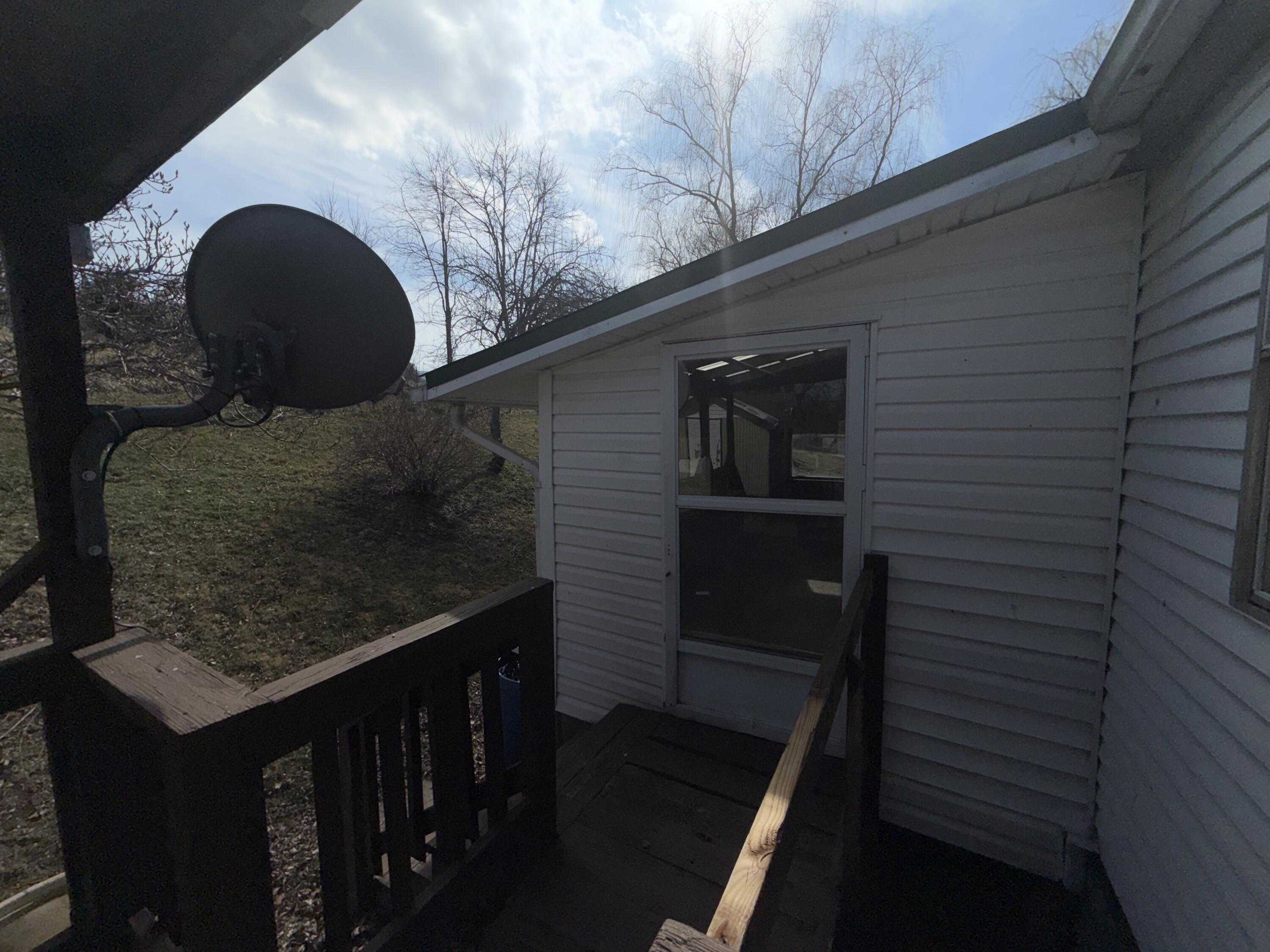 262 Lowe Street Buchanan, VA 24066 - Photo 14 of 36 Entry to sunroom