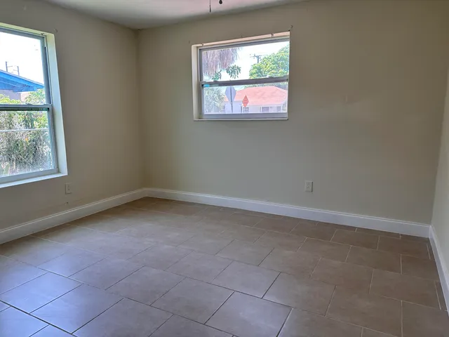 an empty room with windows