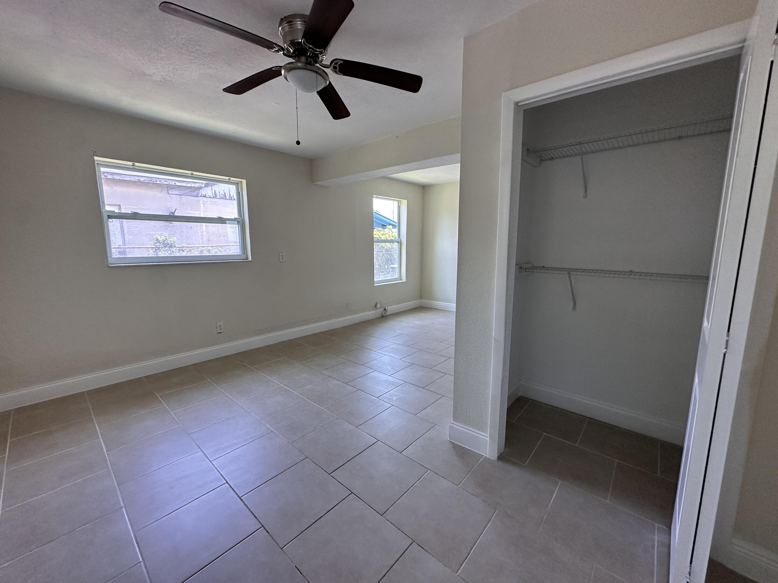 840 West 1st Street Riviera Beach, FL 33404 - Photo 15 of 22 a view of an empty room with a window