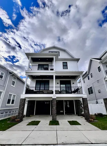 a front view of a building with lots of windows