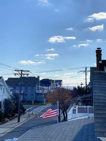 a utility room with sink dryer and washer