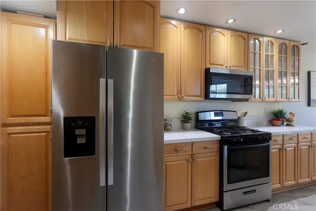 a dining room with furniture and chandelier