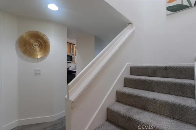 a room with furniture and painting on the wall