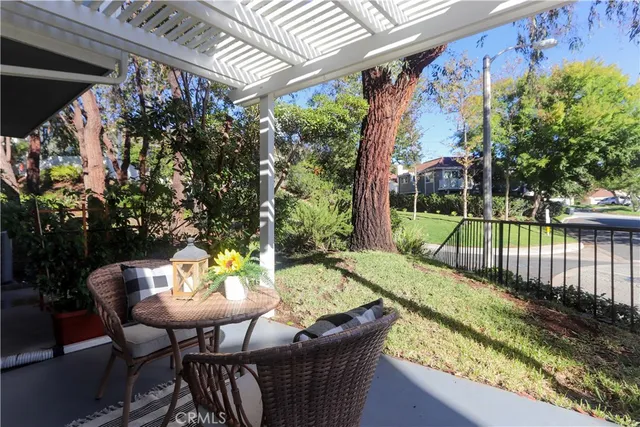 a outdoor living space with patio furniture and a potted plant