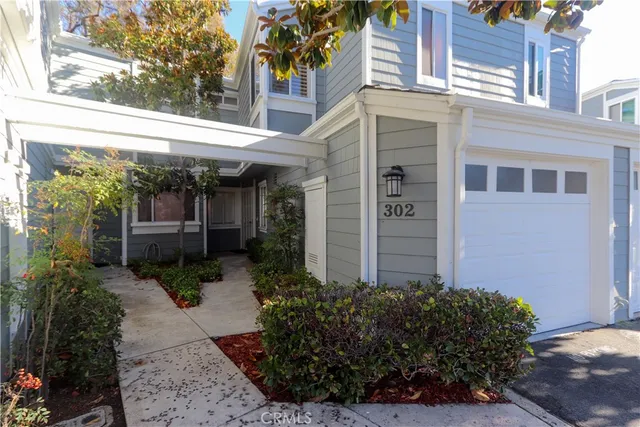 a tree lined with a flower pot