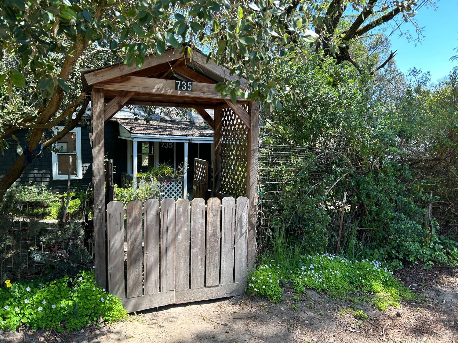 735 Robinson Road Sebastopol, CA 95472 - Photo 1 of 1 a front view of a house with garden