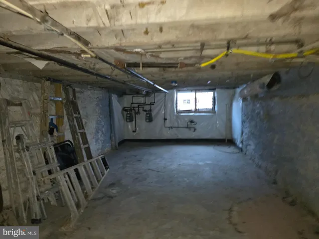 a kitchen with stainless steel appliances a stove and a refrigerator
