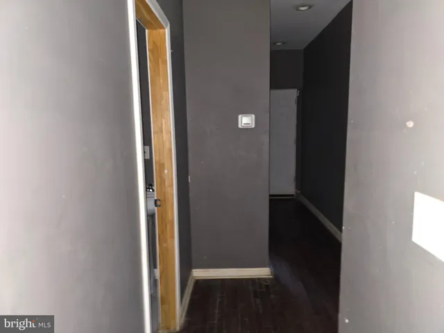a view of a door with an empty room
