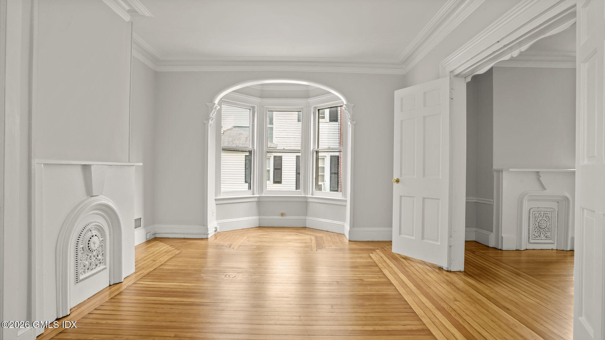 43 Church Street, Unit 1 Greenwich, CT 06830 - Photo 12 of 17 a view of empty room with wooden floor and fan