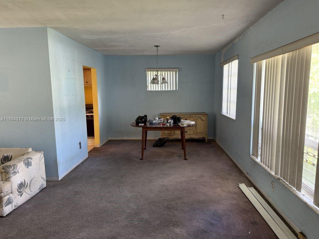 130 Northwest 48th Street Miami, FL 33127 - Photo 7 of 13 a workspace with a window