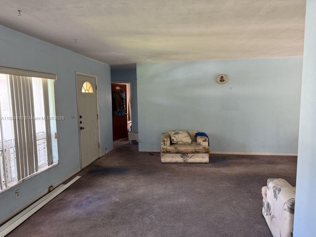130 Northwest 48th Street Miami, FL 33127 - Photo 8 of 13 a room with a mirror