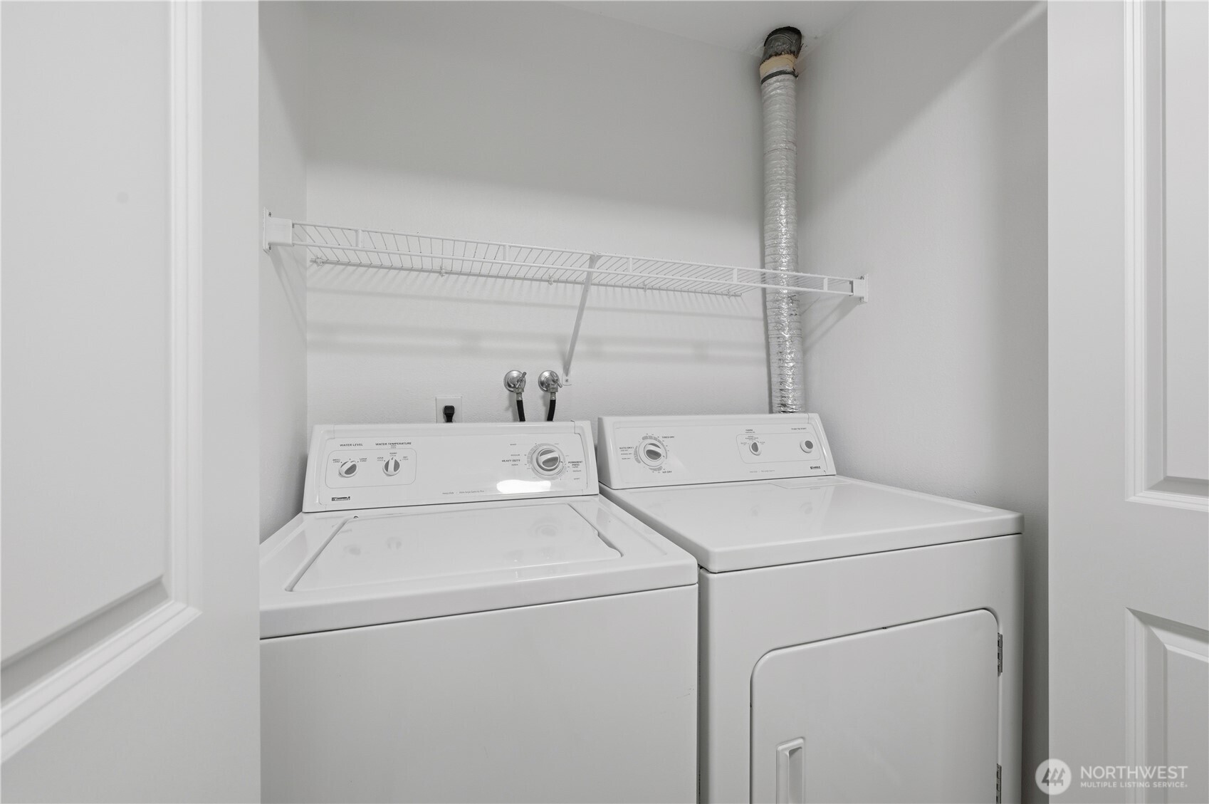 700 Front Street South, Unit E206 Issaquah, WA 98027 - Photo 17 of 32 a utility room with dryer and washer