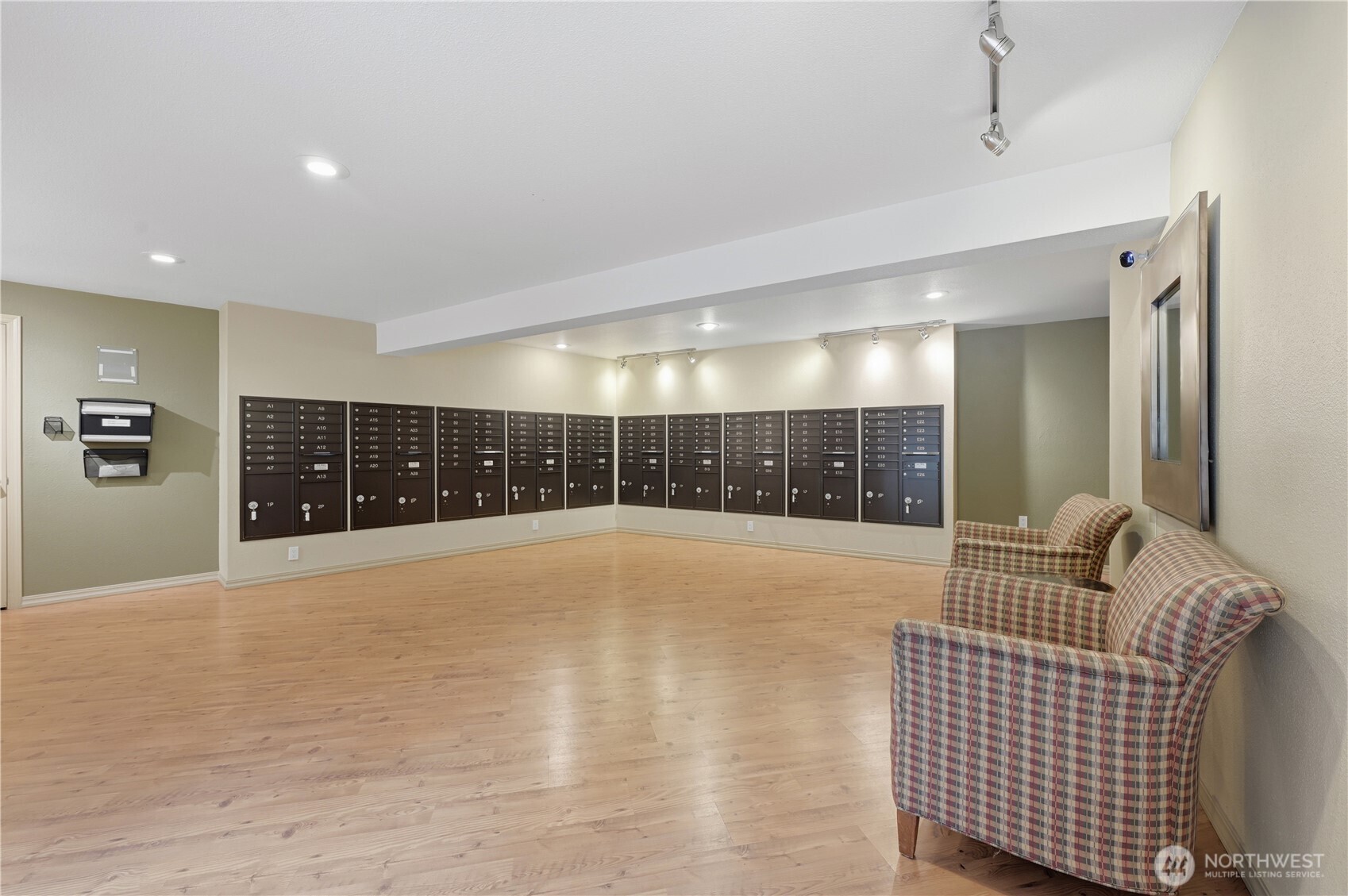 700 Front Street South, Unit E206 Issaquah, WA 98027 - Photo 26 of 32 a view of an empty room with wooden floor