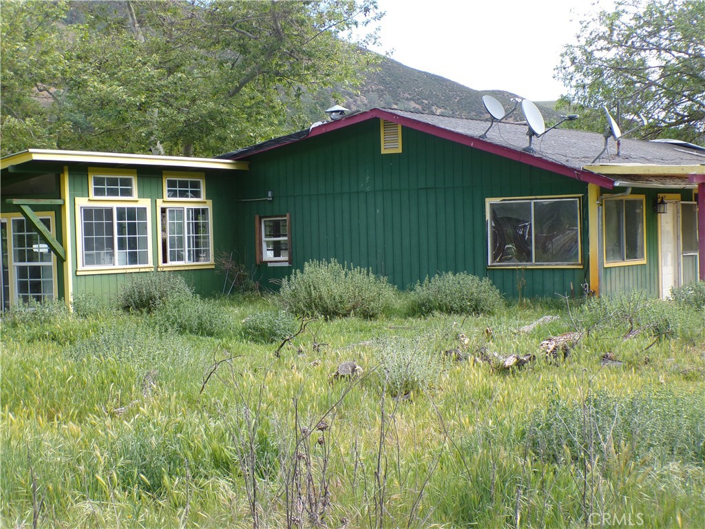 a house that has a lot of plants in it