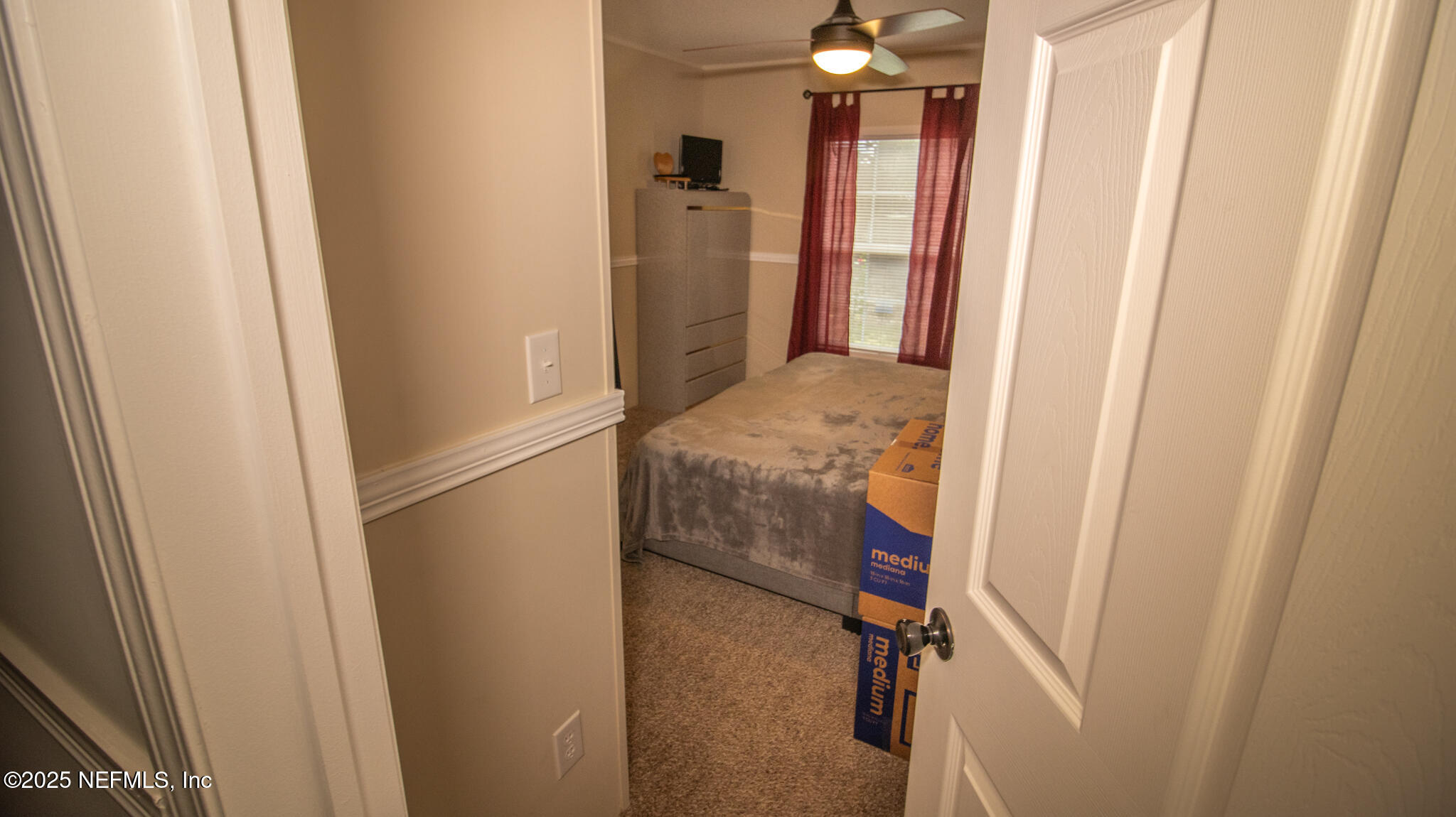 7110 Immokalee Road Keystone Heights, FL 32656 - Photo 19 of 36 a bathroom with a sink and mirror