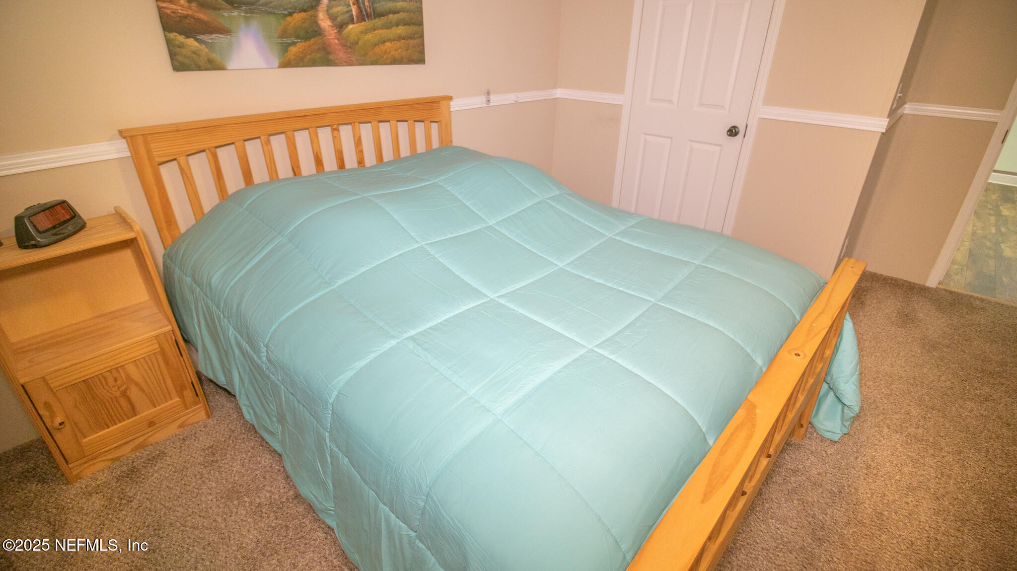 7110 Immokalee Road Keystone Heights, FL 32656 - Photo 23 of 36 a bedroom with a bed and a window