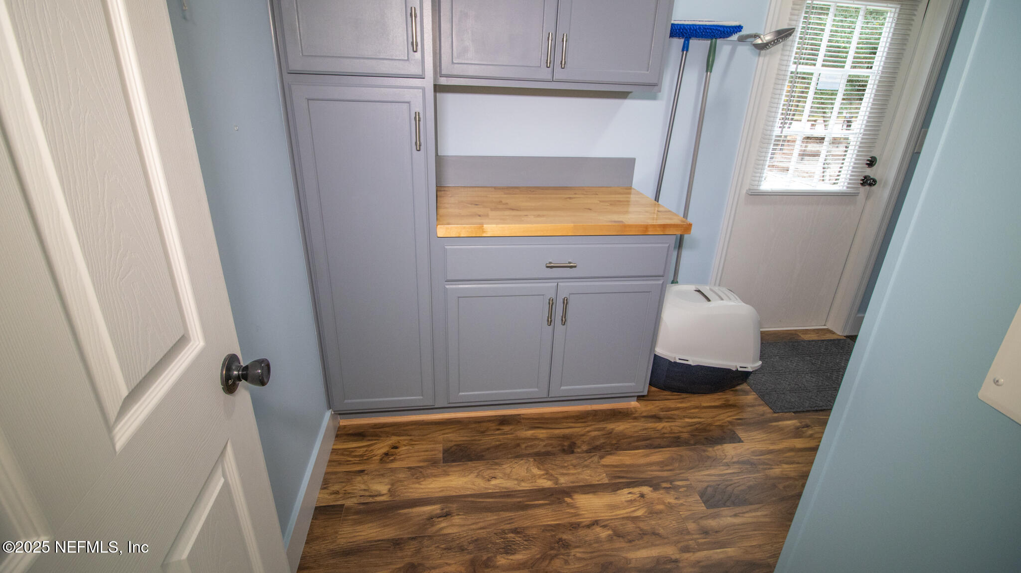 7110 Immokalee Road Keystone Heights, FL 32656 - Photo 24 of 36 a bathroom with a sink toilet and window