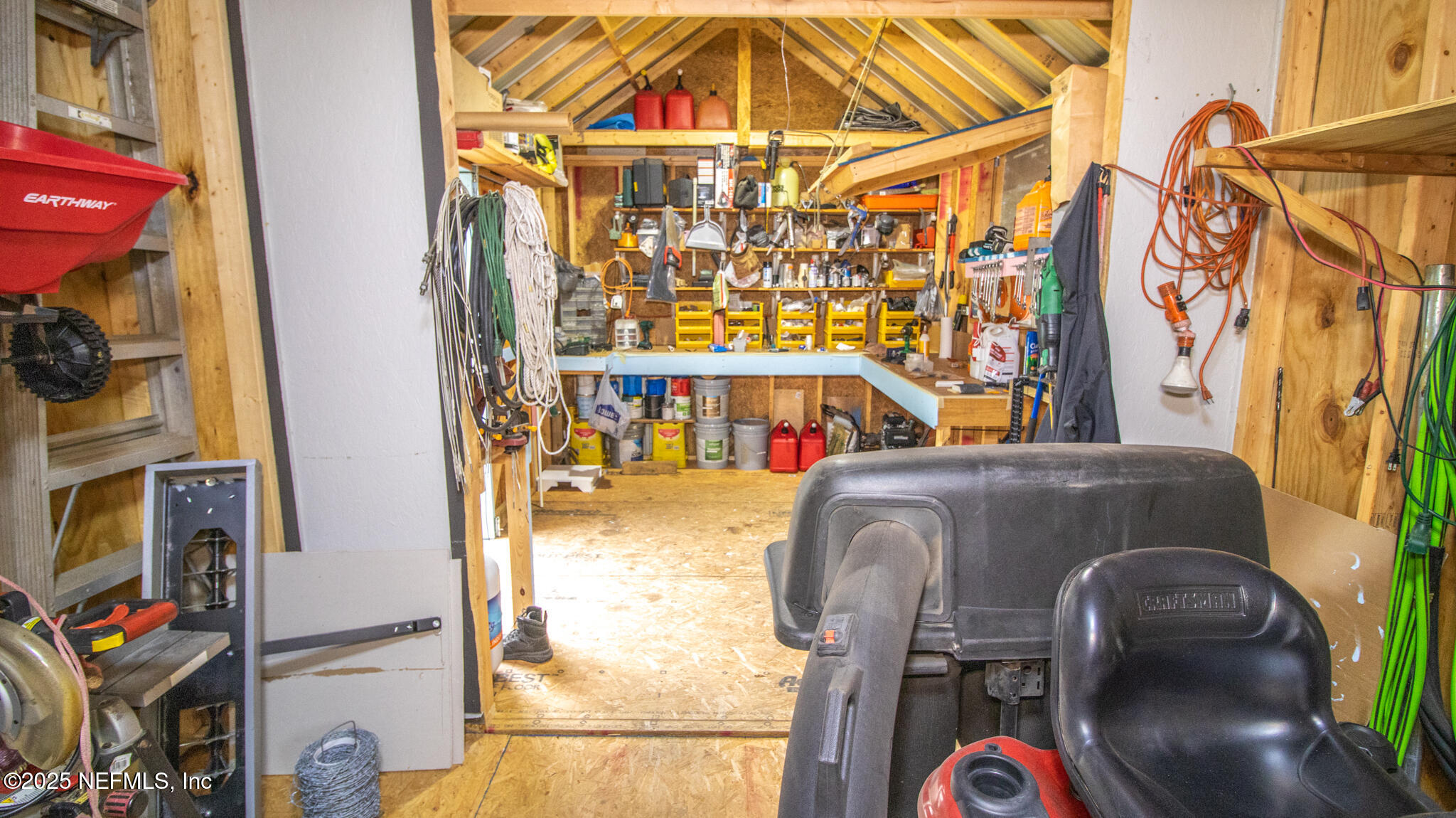 7110 Immokalee Road Keystone Heights, FL 32656 - Photo 35 of 36 a front view of a house with a yard