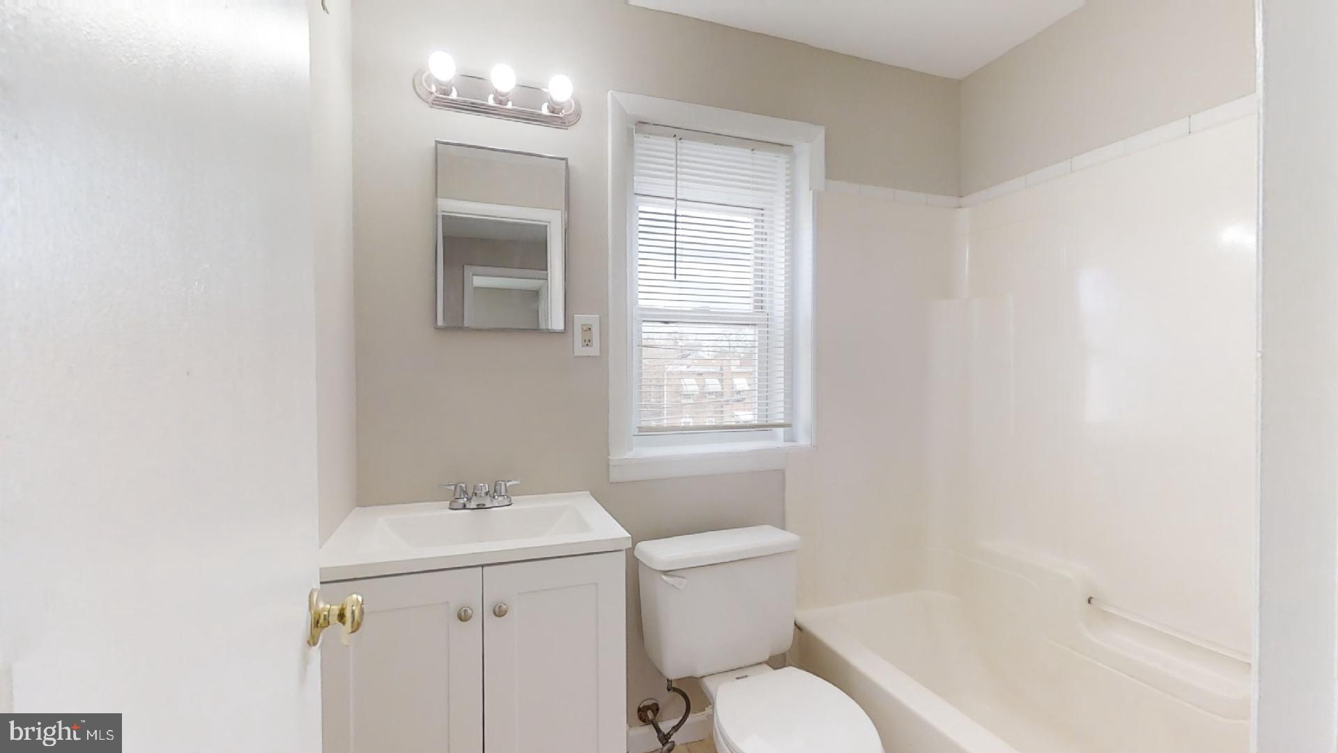 5241 Patrick Henry Drive Brooklyn, MD 21225 - Photo 17 of 33 Upper Level Full Bath