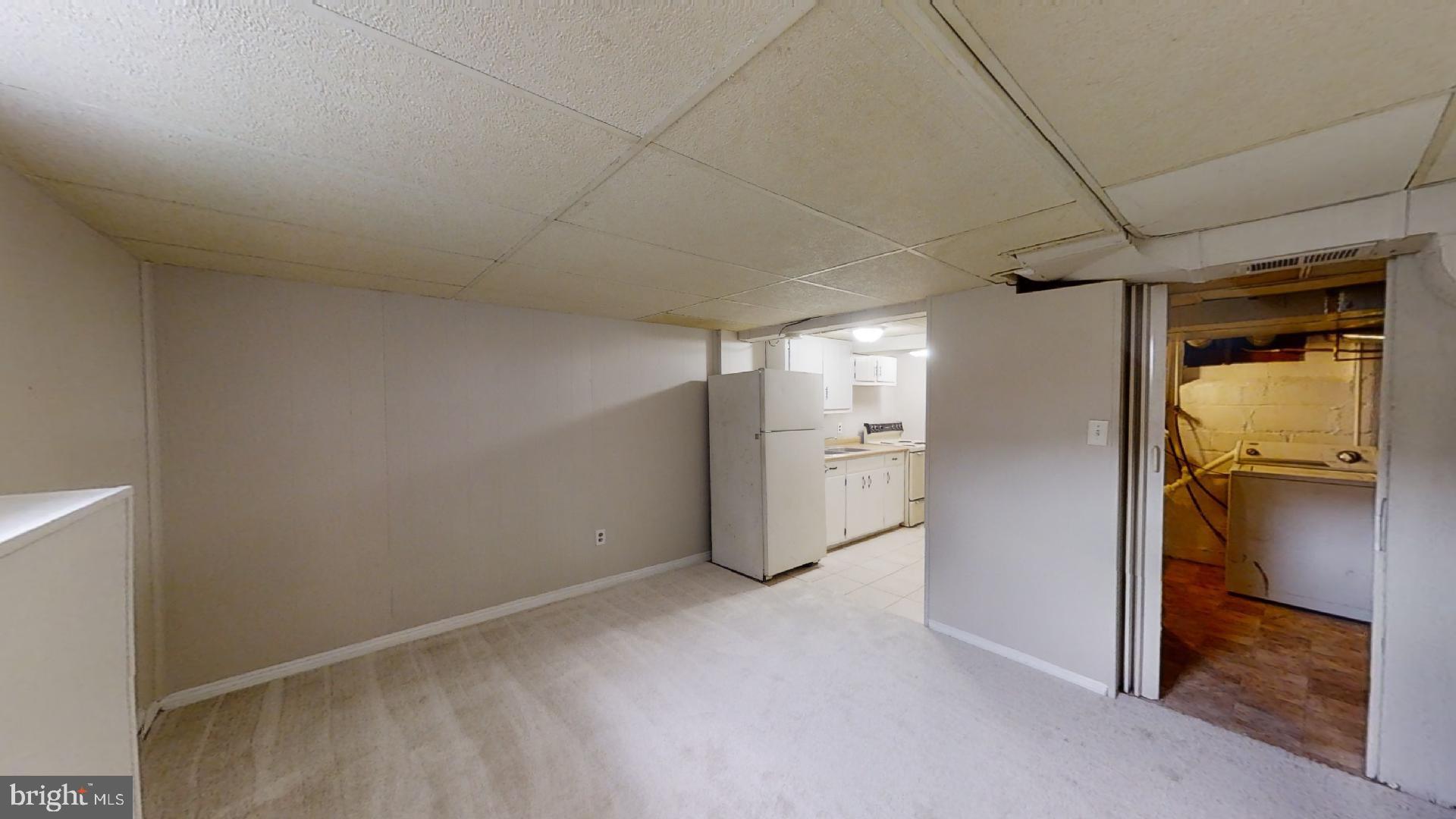 5241 Patrick Henry Drive Brooklyn, MD 21225 - Photo 21 of 33 Lower Level Living Area