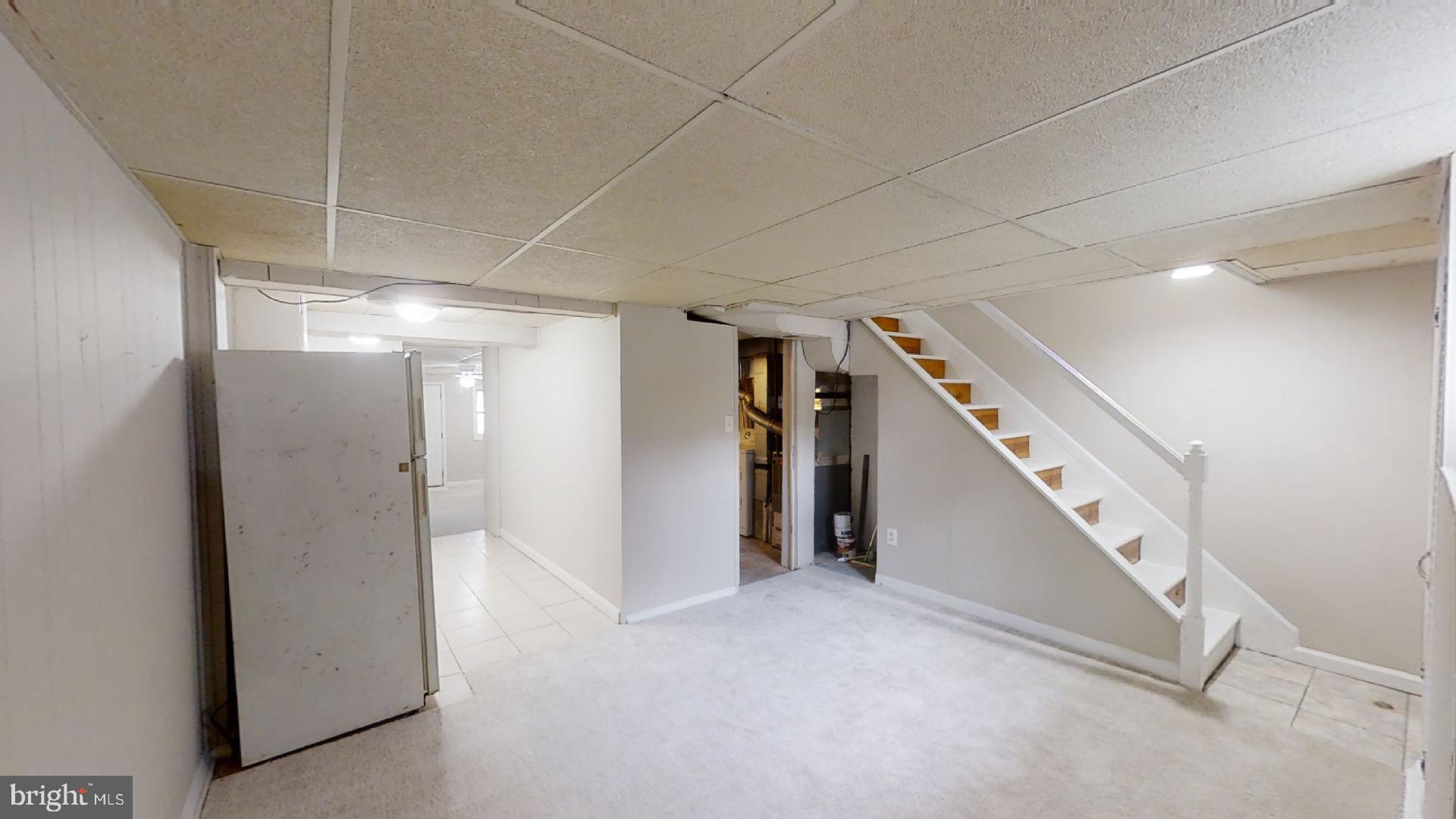 5241 Patrick Henry Drive Brooklyn, MD 21225 - Photo 22 of 33 Lower Level Living Area