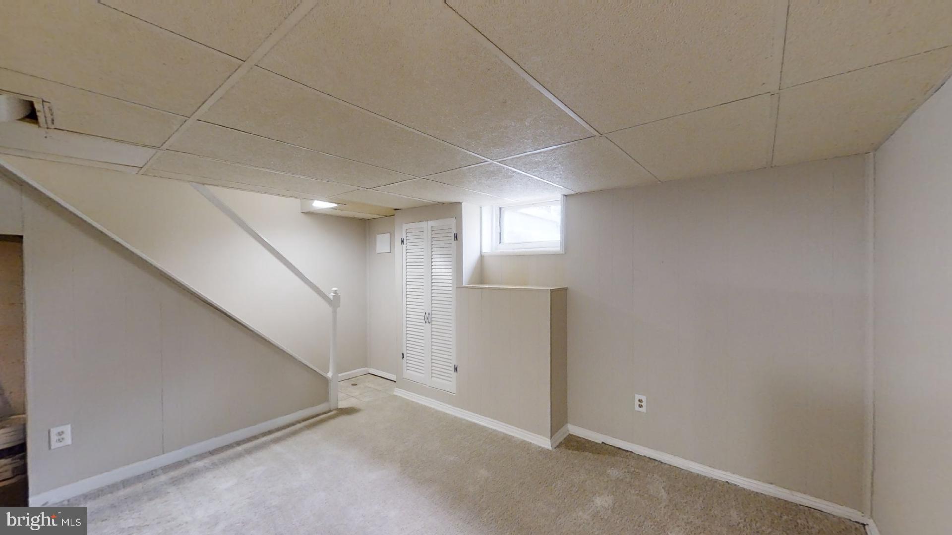 5241 Patrick Henry Drive Brooklyn, MD 21225 - Photo 23 of 33 Lower Level Living Area