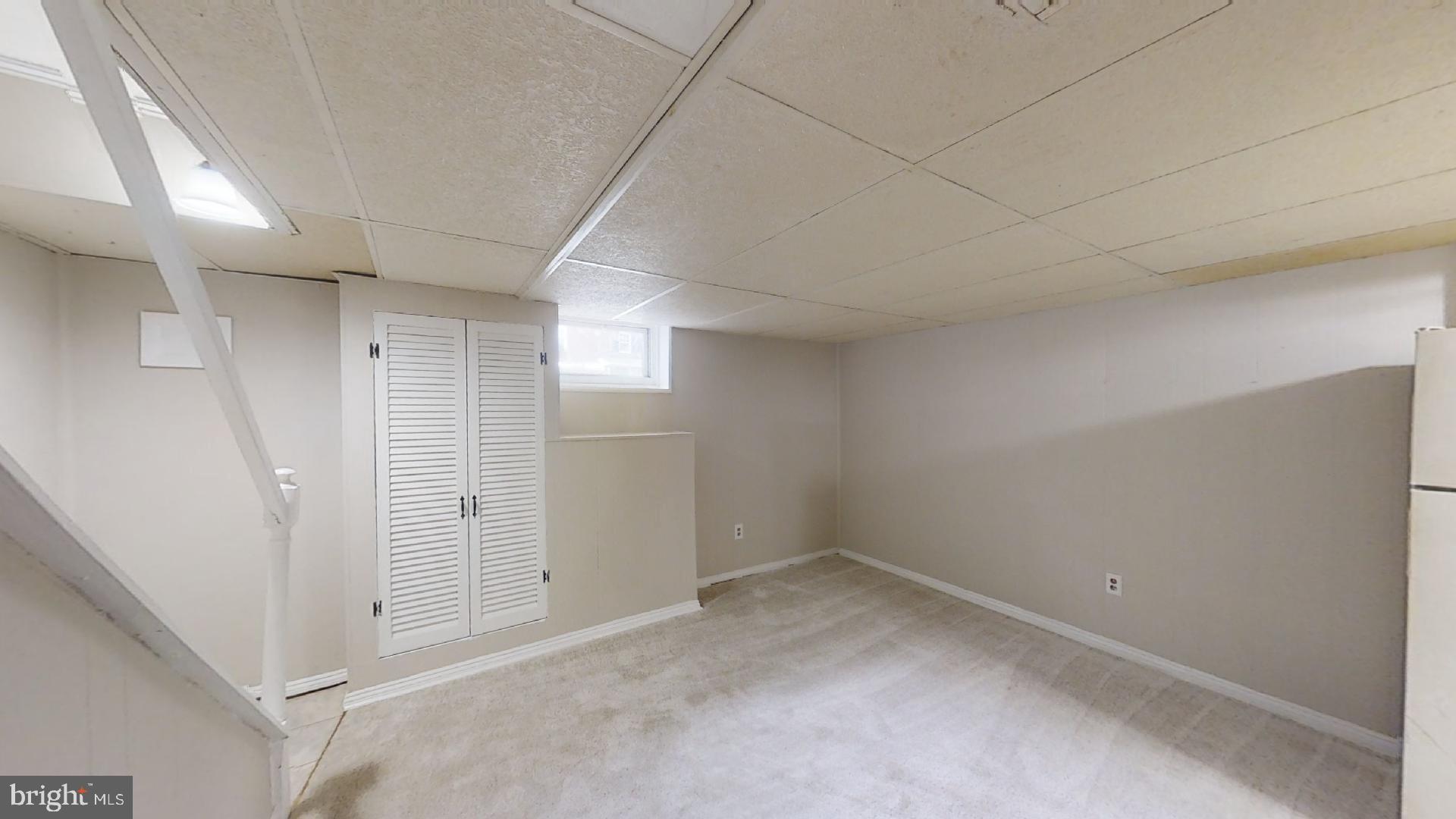 5241 Patrick Henry Drive Brooklyn, MD 21225 - Photo 24 of 33 Lower Level Living Area