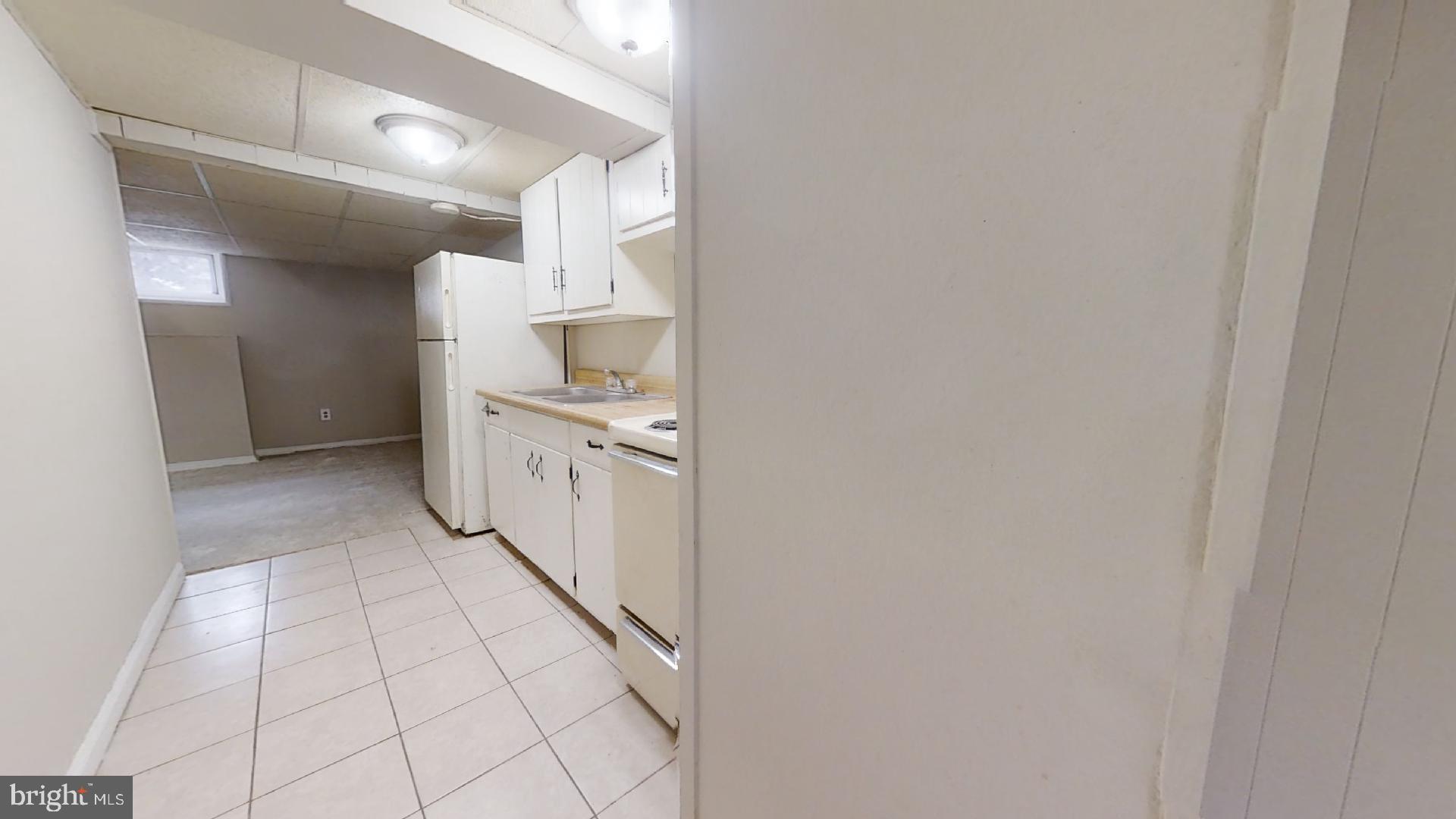 5241 Patrick Henry Drive Brooklyn, MD 21225 - Photo 28 of 33 Lower Level Kitchen