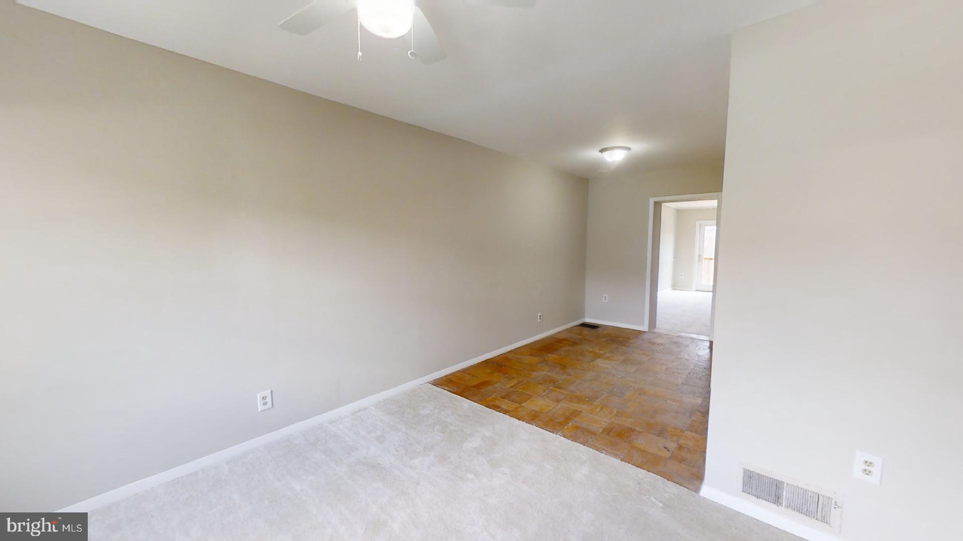 5241 Patrick Henry Drive Brooklyn, MD 21225 - Photo 3 of 33 Living Room on Middle Level