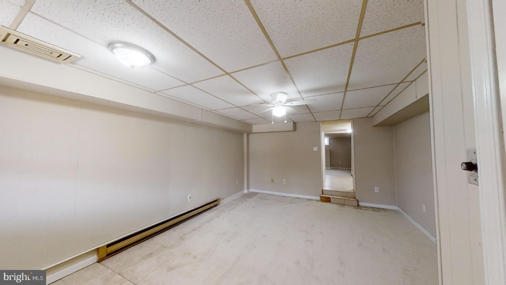 5241 Patrick Henry Drive Brooklyn, MD 21225 - Photo 32 of 33 Lower Level Bedroom or Huge Rec Room