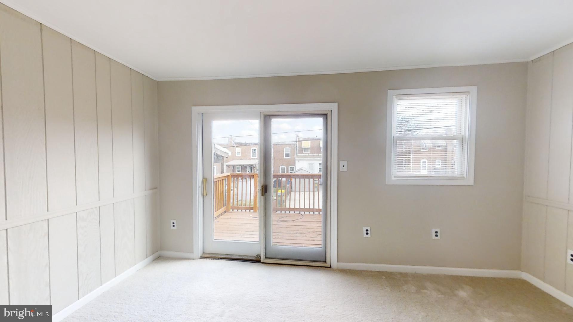 5241 Patrick Henry Drive Brooklyn, MD 21225 - Photo 9 of 33 Slider to Rear Deck