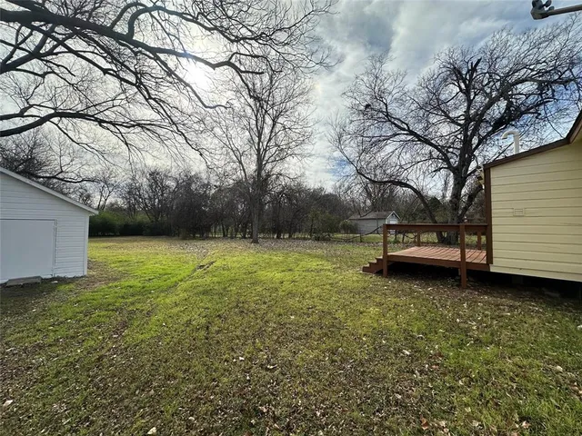 a house view with a garden space