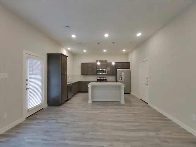 $2,419 | 9835 Willow Creek, Unit 502, Tomball, TX 77375