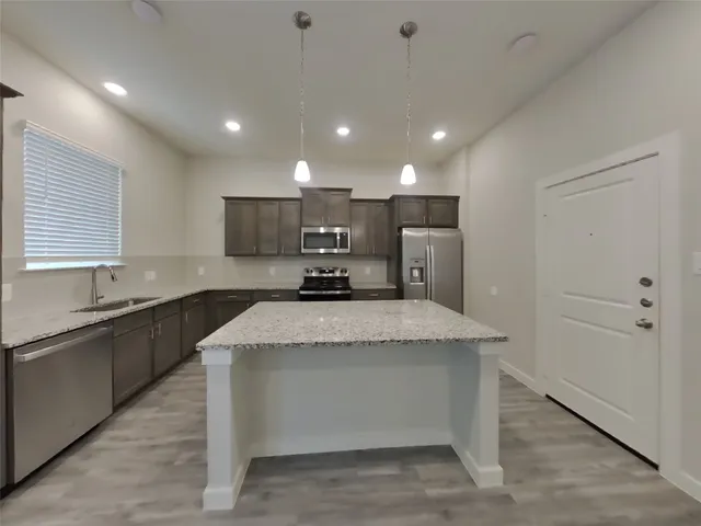 $2,499 | 9835 Willow Creek, Unit 502, Tomball, TX 77375