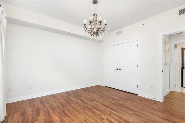 a view of a chandelier in an empty room