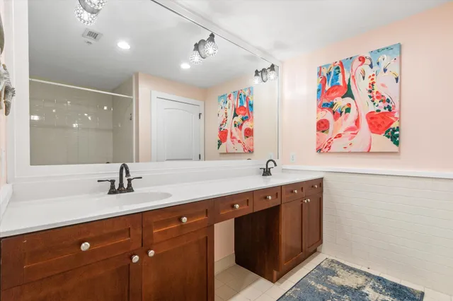 a view of a sink and cabinets