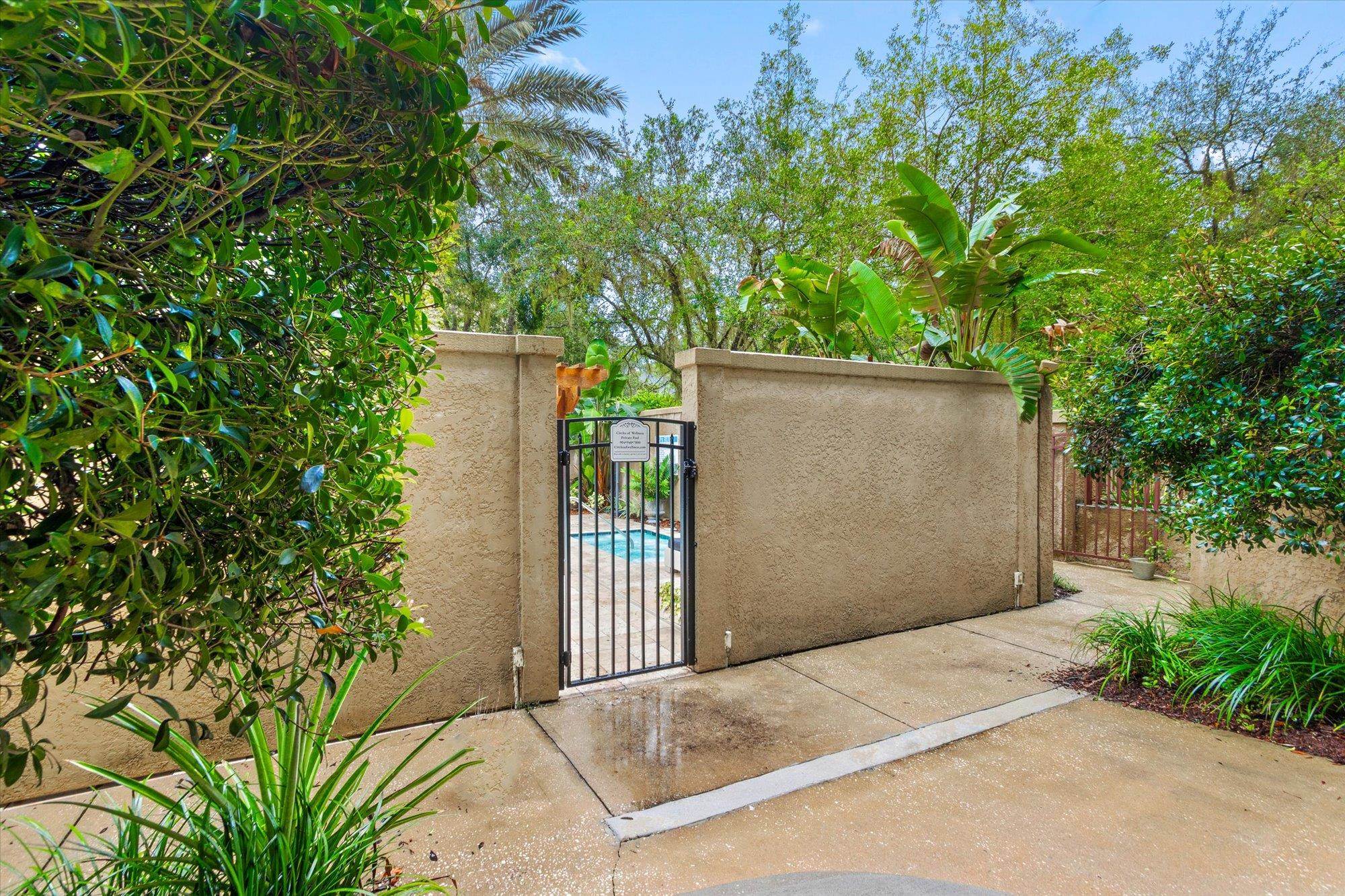 955 Registry Boulevard, Unit 105 St. Augustine, FL 32092 - Photo 27 of 30 front view of a house with a tree