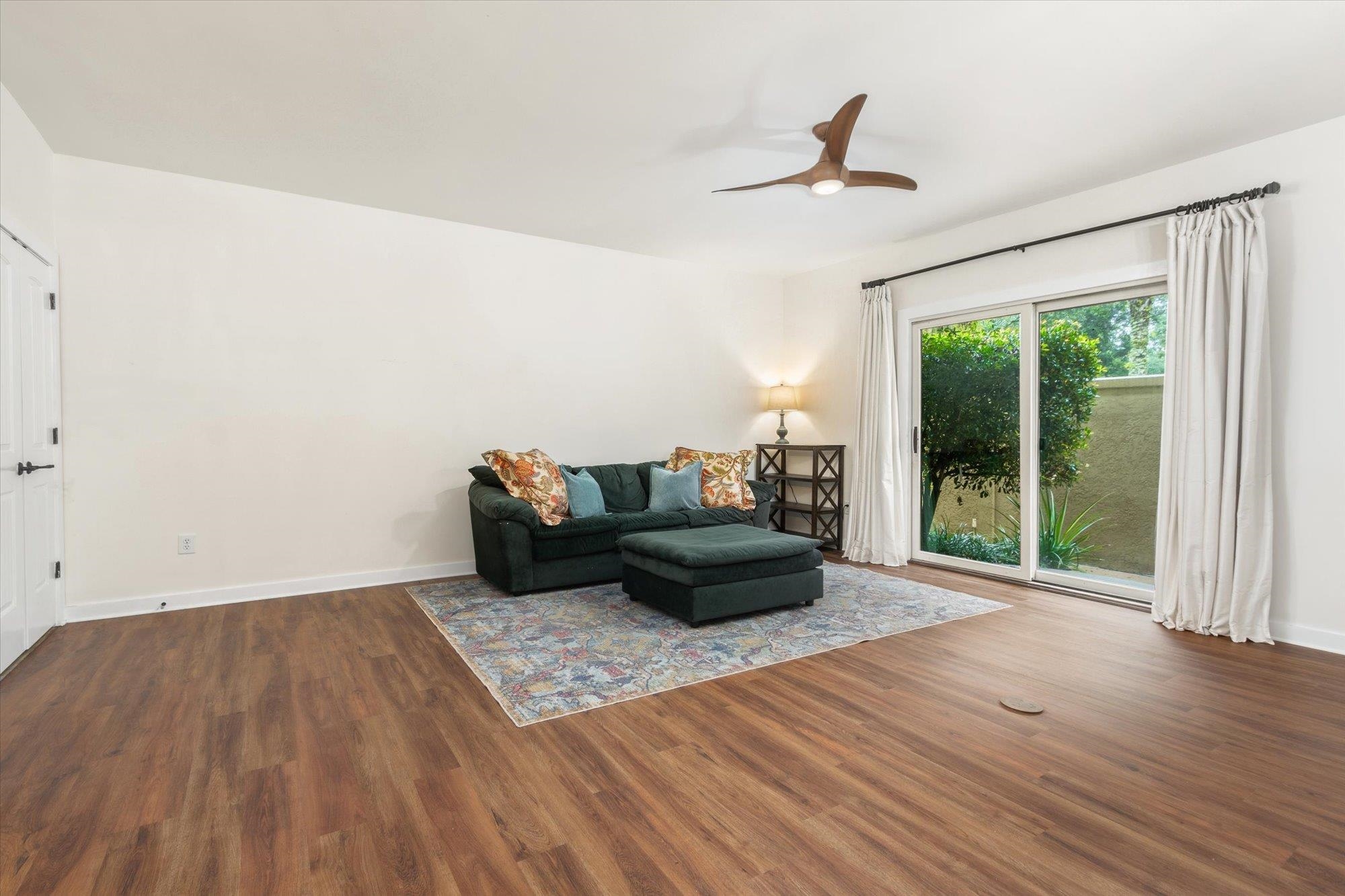 955 Registry Boulevard, Unit 105 St. Augustine, FL 32092 - Photo 7 of 30 a living room with furniture and a window