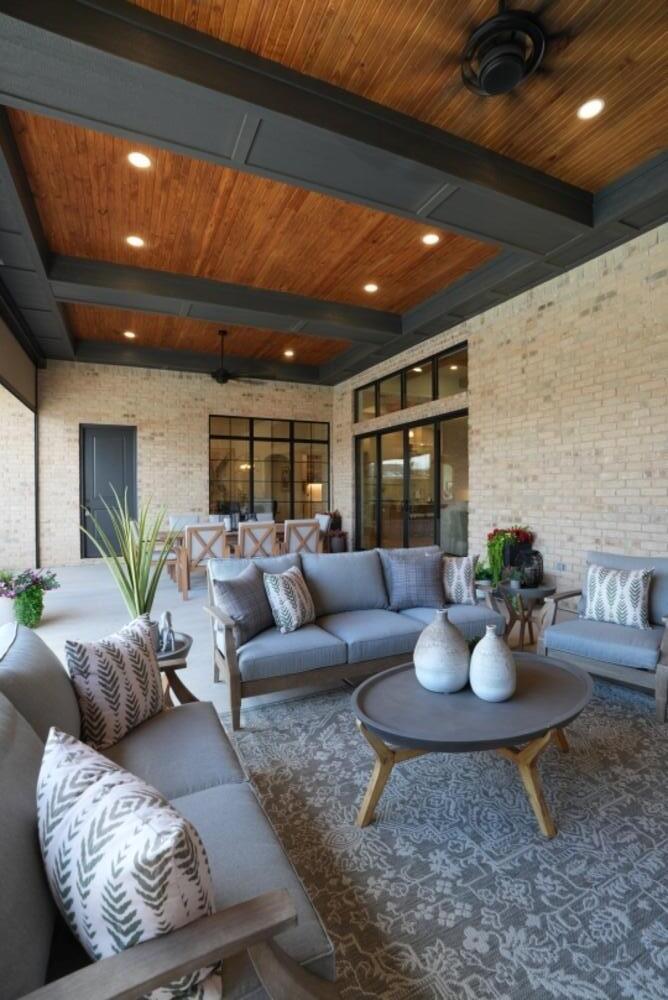 4101 149th Street Lubbock, TX 79423 - Photo 46 of 53 a living room with furniture and a potted plant