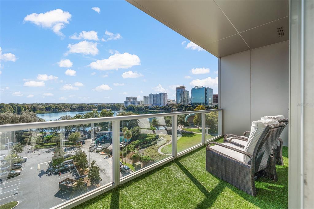 150 East Robinson Street, Unit 601 Orlando, FL 32801 - Photo 18 of 23 a view of a balcony with two chairs