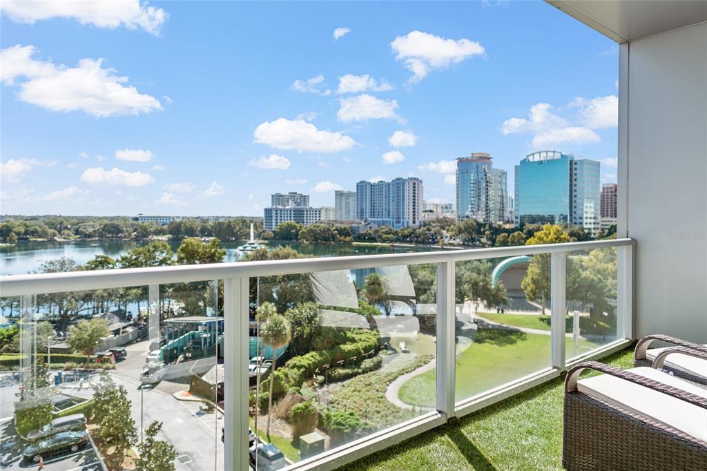150 East Robinson Street, Unit 601 Orlando, FL 32801 - Photo 19 of 23 a view of a balcony with wooden floor