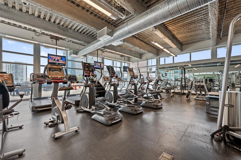 150 East Robinson Street, Unit 601 Orlando, FL 32801 - Photo 20 of 23 a view of a room with gym equipment