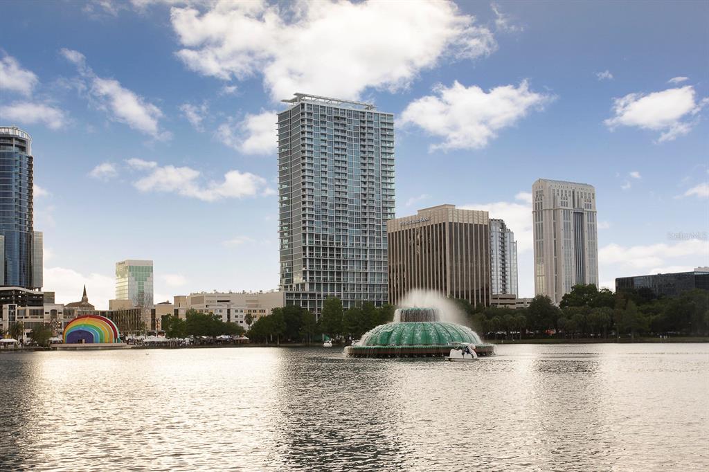 150 East Robinson Street, Unit 601 Orlando, FL 32801 - Photo 2 of 23 a view of a lake with tall buildings
