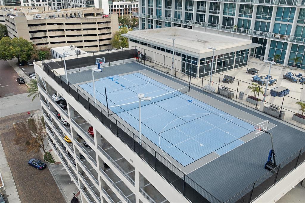 150 East Robinson Street, Unit 601 Orlando, FL 32801 - Photo 23 of 23 a roof view covered with tall trees