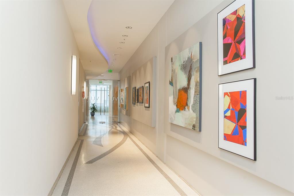 150 East Robinson Street, Unit 601 Orlando, FL 32801 - Photo 4 of 23 an entryway with painting on the wall