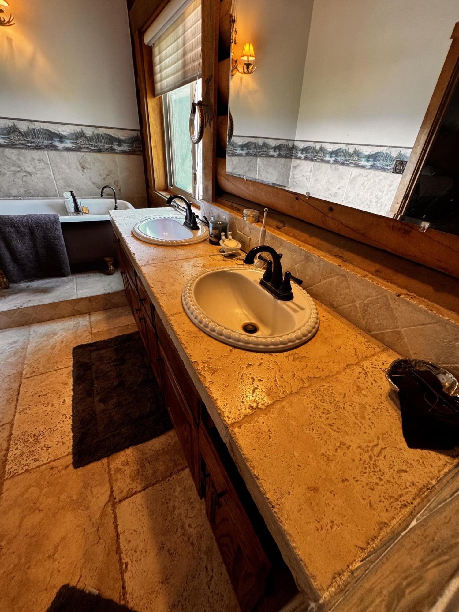30723 Hamilton Drive Exeter, CA 93221 - Photo 34 of 85 a bathroom with a sink and a mirror