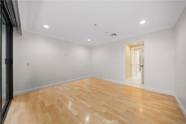 a room view with granite countertop a sink a washer and dryer